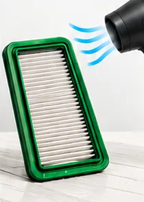 Hair dryer blowing cool air on the filter